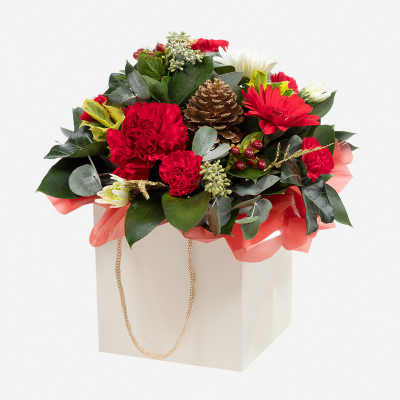 A Christmas Carol - A selection of customer favourite flowers and foliage in a design that’s simply the perfect Christmas present.
