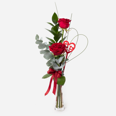 Two Become One
 - This delightful pairing of gorgeous roses with a contrast of foliage is a perfect gift for that special someone. Lovingly placed in a pretty vase made just for two.