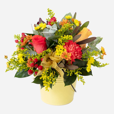 Pot of Gold Arrangement - The best gifts come in small packages. Inspire them this Autumn with a petite arrangement combining the seasonal favourites. Made and delivered by an artisan florist.